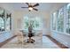 Bright breakfast nook with a decorative ceiling fan and a great view at 809 Verney Ln, Charlotte, NC 28226