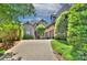 Charming brick home with a three-car garage and a patterned brick driveway at 809 Verney Ln, Charlotte, NC 28226