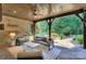 Inviting outdoor patio featuring a ceiling fan, and comfortable seating at 809 Verney Ln, Charlotte, NC 28226