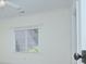 An indoor wall with a window with white blinds at 809 Verney Ln, Charlotte, NC 28226