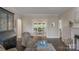 Living room with fireplace and access to an office at 8400 Prince Valiant Dr, Waxhaw, NC 28173