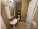 Small bathroom featuring a pedestal sink, tile floors, and a neutral color scheme at 907 Mcgowan Rd, Shelby, NC 28150