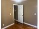 Cozy bedroom with hardwood floors, closet with storage space, and ample natural light for a welcoming atmosphere at 907 Mcgowan Rd, Shelby, NC 28150
