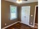 This bedroom has hardwood floors, a window letting in natural light, and a double door closet at 907 Mcgowan Rd, Shelby, NC 28150