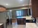 View of the kitchen and dining area with stainless steel appliances and hardwood floors at 907 Mcgowan Rd, Shelby, NC 28150