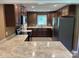 Well-equipped kitchen boasting stainless steel appliances, ample cabinet space, and countertops at 907 Mcgowan Rd, Shelby, NC 28150