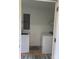 Bright laundry room with a washer, dryer, and tile flooring at 907 Mcgowan Rd, Shelby, NC 28150