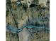 Aerial view illustrating the property's layout with woodland and boundaries, showcasing its unique features at 910 Mcgowan Rd, Shelby, NC 28150
