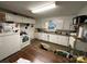 Functional kitchen with white appliances, ample cabinet space, and a bright window overlooking the yard at 910 Mcgowan Rd, Shelby, NC 28150