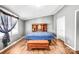 Serene bedroom featuring hardwood floors and ample space, with a cozy atmosphere perfect for relaxation and rest at 10230 Hagers Rd, Huntersville, NC 28078