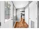 Bright entryway featuring hardwood floors and access to the kitchen area, offering a welcoming transition into the home at 10230 Hagers Rd, Huntersville, NC 28078