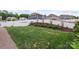 Well-maintained backyard with a white fence and professionally landscaped garden beds at 108 Wrangler Dr, Mooresville, NC 28115