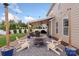 Inviting backyard features a firepit, patio, string lights, and well-maintained landscaping at 108 Wrangler Dr, Mooresville, NC 28115