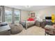 Comfortable bedroom with a large window and neutral decor at 108 Wrangler Dr, Mooresville, NC 28115