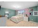 Charming bedroom with unique wallpaper and ample natural light at 108 Wrangler Dr, Mooresville, NC 28115