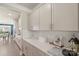 Kitchen featuring white cabinets, quartz countertops, subway tile backsplash, and stainless steel appliances at 108 Wrangler Dr, Mooresville, NC 28115