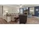 Relaxing living room featuring a fireplace, comfortable seating, and stylish decor at 108 Wrangler Dr, Mooresville, NC 28115