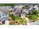 A birds-eye view of a two-story home featuring an attached garage and situated in a friendly neighborhood at 11014 Aspen Ridge Nw Ln, Concord, NC 28027