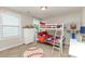 This bedroom features a bunk bed, light colored walls, and natural light from two windows at 11014 Aspen Ridge Nw Ln, Concord, NC 28027