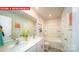 Well-lit bathroom with dual sinks, framed mirror, tub-shower, and neutral decor at 11128 Cardinal Creek Ave, Charlotte, NC 28215