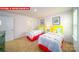 Bright bedroom with yellow headboards and colorful butterfly-themed decorations at 11128 Cardinal Creek Ave, Charlotte, NC 28215