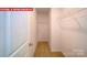 Walk-in closet with carpet and wire shelving for easy storage at 11128 Cardinal Creek Ave, Charlotte, NC 28215