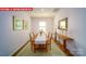 Chic dining area with hardwood floors, decorative accents, and ample natural light at 11128 Cardinal Creek Ave, Charlotte, NC 28215