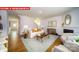 Inviting living room with a fireplace, plush seating, and warm wood floors offer a comfortable and stylish space at 11128 Cardinal Creek Ave, Charlotte, NC 28215