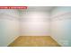 Spacious walk-in closet with adjustable shelving and neutral carpeting at 11128 Cardinal Creek Ave, Charlotte, NC 28215