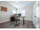Bright home office with modern desk, comfortable chair and plenty of space to work at 112 Tanner Loop, Troutman, NC 28166