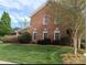 Lovely brick home with lush green lawn and well-manicured landscaping at 1142 Ardwyck Pl # 5, Rock Hill, SC 29730