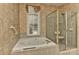 A primary bathroom featuring soaking tub and walk-in shower at 1142 Ardwyck Pl # 5, Rock Hill, SC 29730