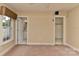 Neutral bedroom featuring a window, closet, and bathroom access at 1142 Ardwyck Pl # 5, Rock Hill, SC 29730