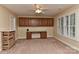 Bedroom featuring a built-in desk and cabinets with a ceiling fan at 1142 Ardwyck Pl # 5, Rock Hill, SC 29730