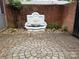 Private courtyard featuring a lovely stone fountain and brick accents at 1142 Ardwyck Pl # 5, Rock Hill, SC 29730