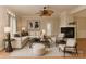 Bright living room features a fireplace, ceiling fan, and neutral tones throughout at 1142 Ardwyck Pl # 5, Rock Hill, SC 29730