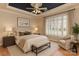 Bedroom features a tray ceiling, neutral walls, hardwood floors, large window, and sitting area at 1142 Ardwyck Pl # 5, Rock Hill, SC 29730