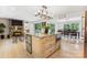 Chefs Kitchen with large island and stainless appliances is open to living spaces at 115 Forestcliff Ne Ct, Concord, NC 28025