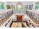 Expansive foyer and staircase with wrought iron railings and oversized chandelier at 115 Forestcliff Ne Ct, Concord, NC 28025