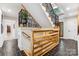 A beautiful staircase with wood and wrought iron features welcomes you to this light and airy home at 115 Forestcliff Ne Ct, Concord, NC 28025