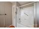 Bathroom with a shower/tub combo with glass doors and metal safety bars at 1205 Southwood Dr, Newton, NC 28658