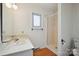 Bathroom features white vanity, shower, and toilet with a neutral color scheme at 1205 Southwood Dr, Newton, NC 28658