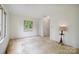 Bedroom with neutral carpeting and paint features multiple windows for plenty of natural light at 1205 Southwood Dr, Newton, NC 28658