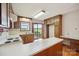 Kitchen features wood cabinets, a range oven, laminate countertops, and access to the backyard at 1205 Southwood Dr, Newton, NC 28658