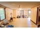 Large, open living room with unique flooring, neutral walls, and a large window at 1491 Cedar Grove Rd, Clover, SC 29710