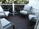 Cozy outdoor deck with modern patio furniture, creating an inviting space for relaxation and entertaining at 1502 Mulberry Ridge Dr # 1, Newton, NC 28658
