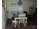 Cozy dining room features a chandelier and lots of natural light at 1502 Mulberry Ridge Dr # 1, Newton, NC 28658