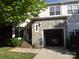 Charming home featuring stone accents, attached garage, and landscaped front yard at 1502 Mulberry Ridge Dr # 1, Newton, NC 28658