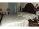 Comfortable main bedroom featuring a dark wood bedframe and neutral color palette at 1502 Mulberry Ridge Dr # 1, Newton, NC 28658