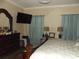 Well lit main bedroom features neutral colored walls and dark accents at 1502 Mulberry Ridge Dr # 1, Newton, NC 28658